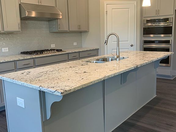 Open concept kitchen and LR. Space for seating at the bar