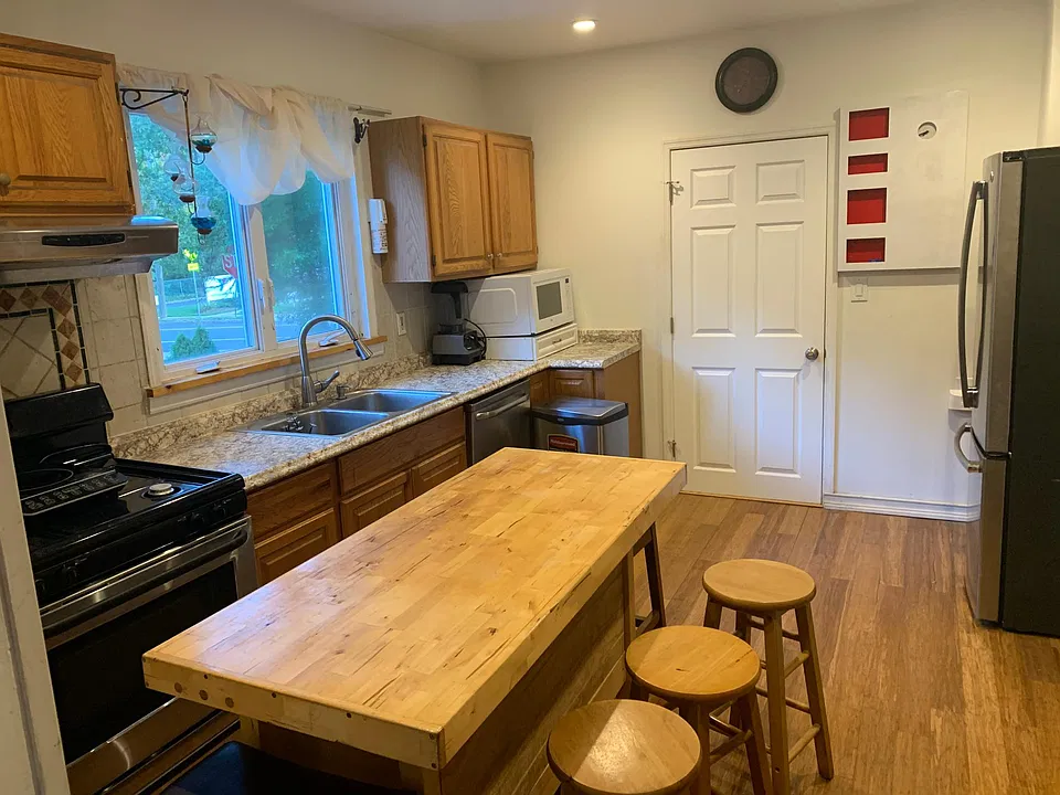 Kitchen includes all SS Oven range, dishwasher, and double doors refrigerator. Eat in Kitchen. ALL UTILITIEs included.