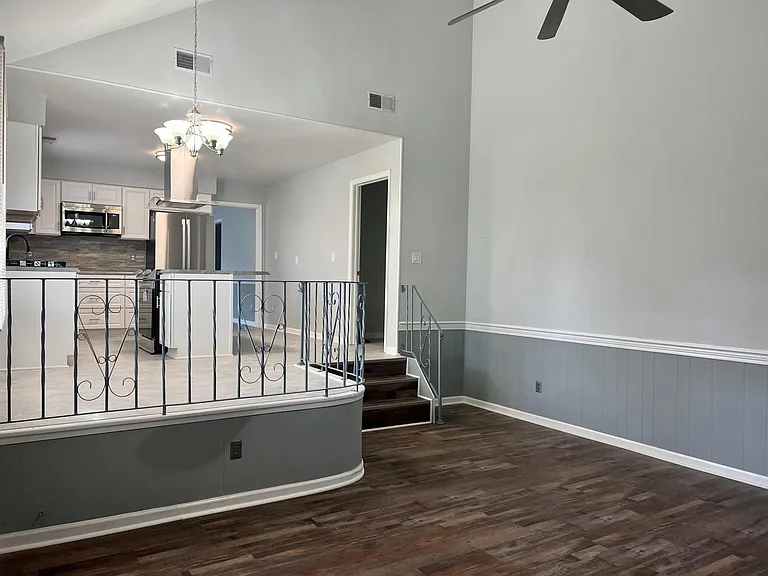 Sunken den leading to kitchen