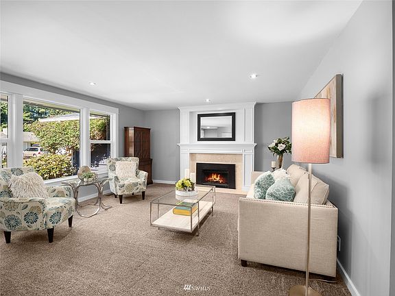 Wall of windows allowing natural light to pour in.