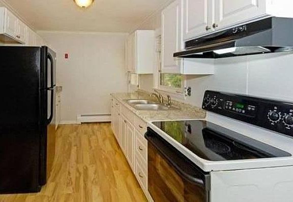 Updated kitchen with plenty of cabinet space and a new dishwasher