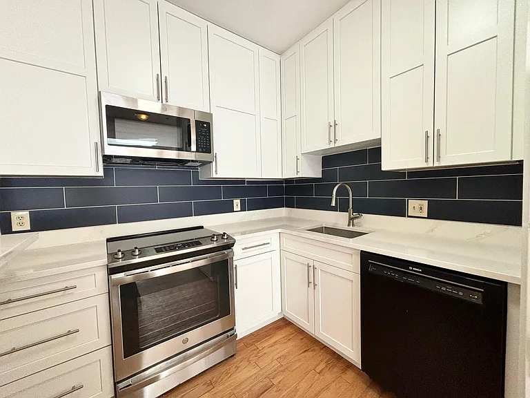 White Shaker Style Cabinetry with Quartz Counters