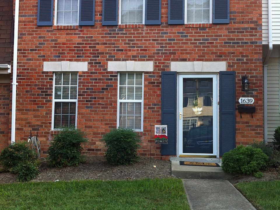 Front entrance; view from reserved parking spot.