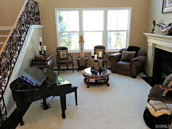 Open Living Room with Crown Molding, Window Molding, Black Galax