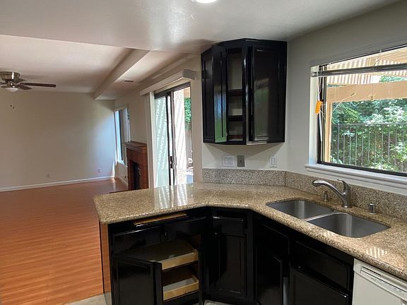 Kitchen with view into the den.
