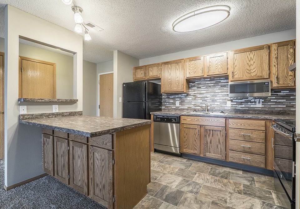 Our renovated kitchens are designed to impress with updated cabinetry, sleek countertops, stainless steel appliances, and a modern tile backsplash that brings it all together.