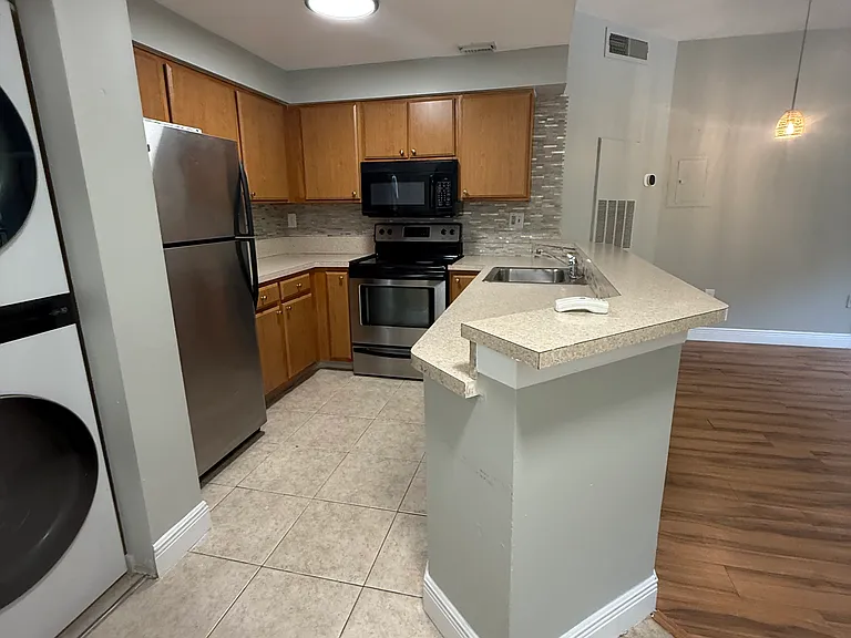 2445 SW 18th Ter #220 — Photo 1