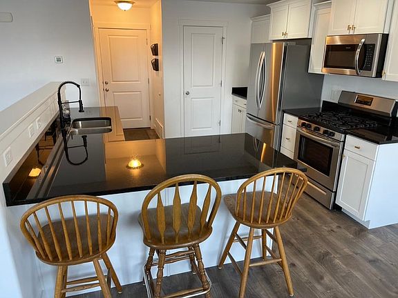 Kitchen with Upgraded Finishes and 5 Burner Gas Stove
