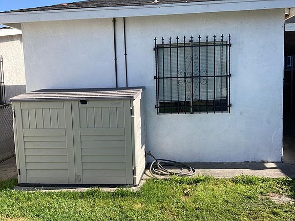 Laundry hookups for washer and gas dryer located in enclosure