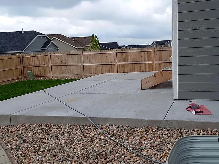 Large Rear patio, 30 X 16. Walkway, lawn.