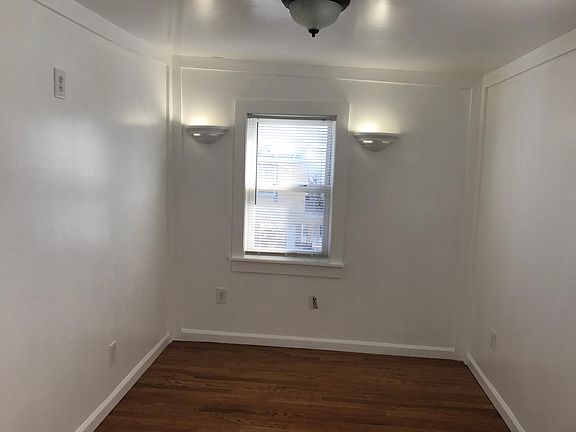 bedroom w/wall sconces