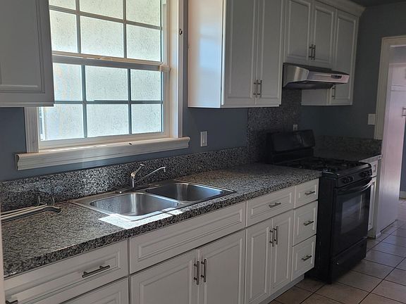 Kitchen with granite counter top