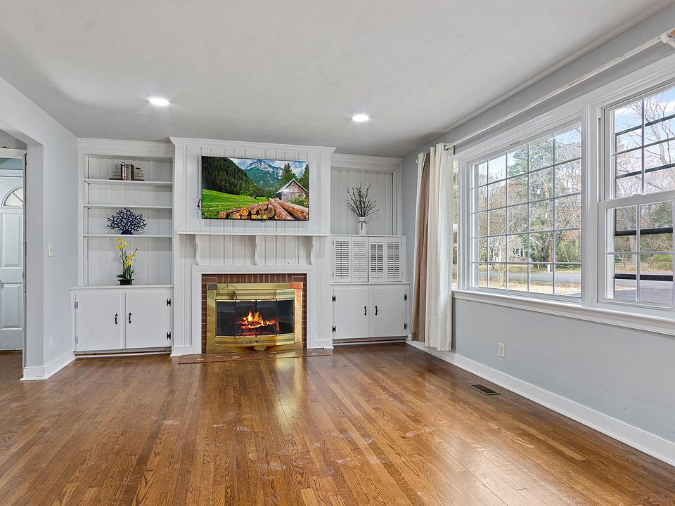 Built-In Shelves, Wood Burning Fireplace, New Recessed Light Fixtures