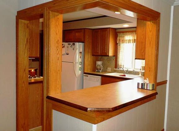 Bar off the kitchen is open to the dining room