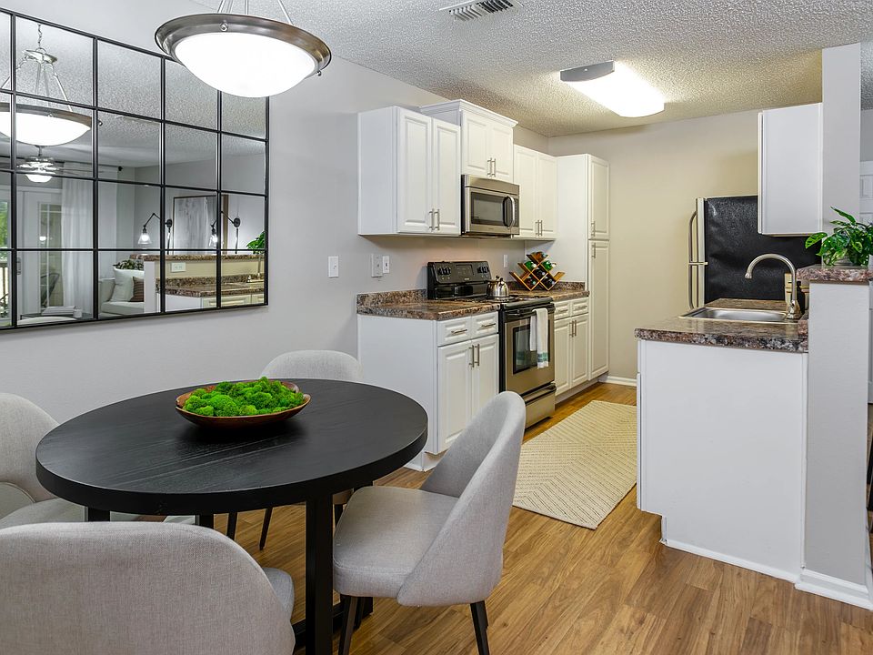 From meal prep to dinner parties, this open-concept kitchen and dining area offers both functionality and style with a spacious layout and contemporary design.