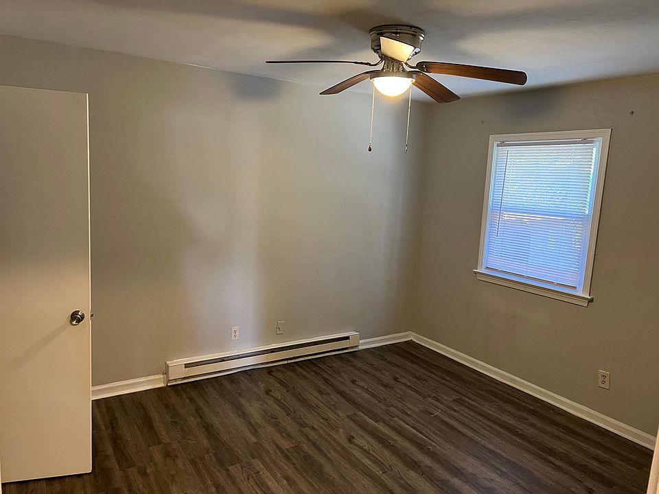 Bedroom with large closet and ceiling fan