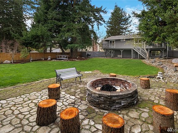 Aerial view of home on over 1/3 acre lot with RV parking