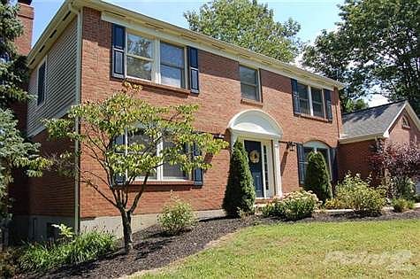 This brick-wrapped home was Drees Builder's model during this area's development.