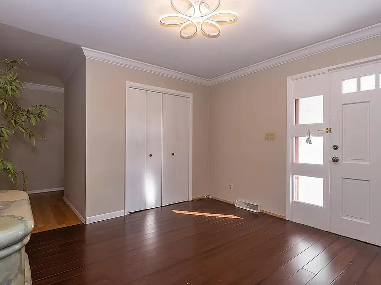 Entrance / Foyer with guest closet.