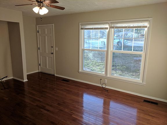 Spacious living room with beautiful hardwood floors