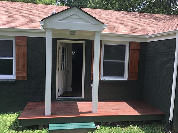Front Door to this unit is on the front of the house.