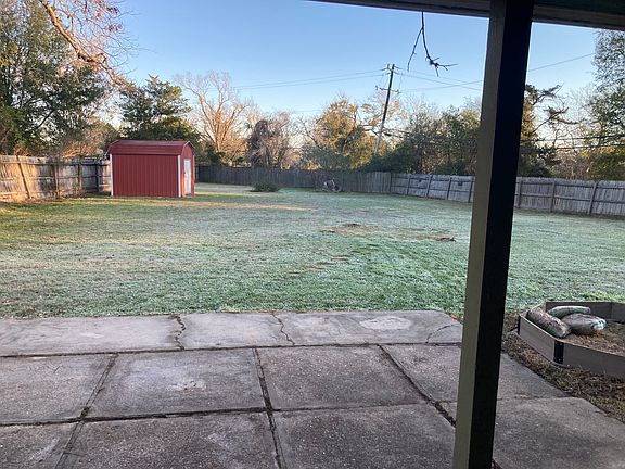 back yard with storage shed