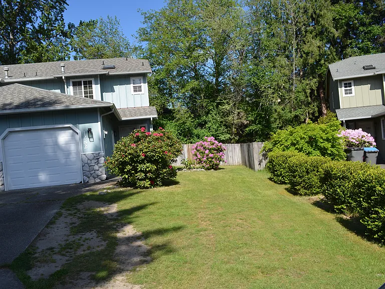 Front view with landscaping.