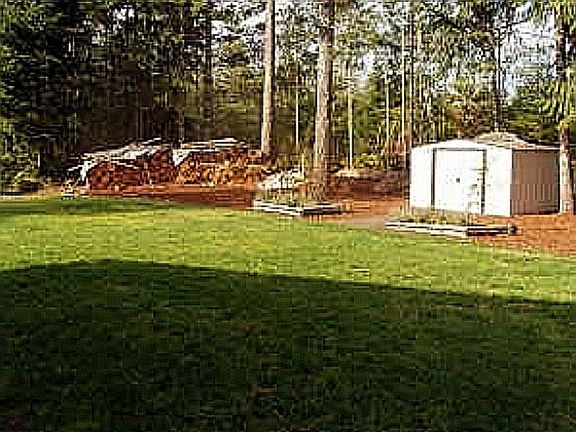 Outbuilding and wood
