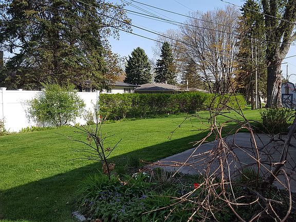 Tall Fence in Back Yard