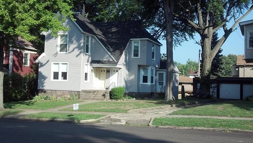 Front of Home - Door on the Right is the entry for the apartment.