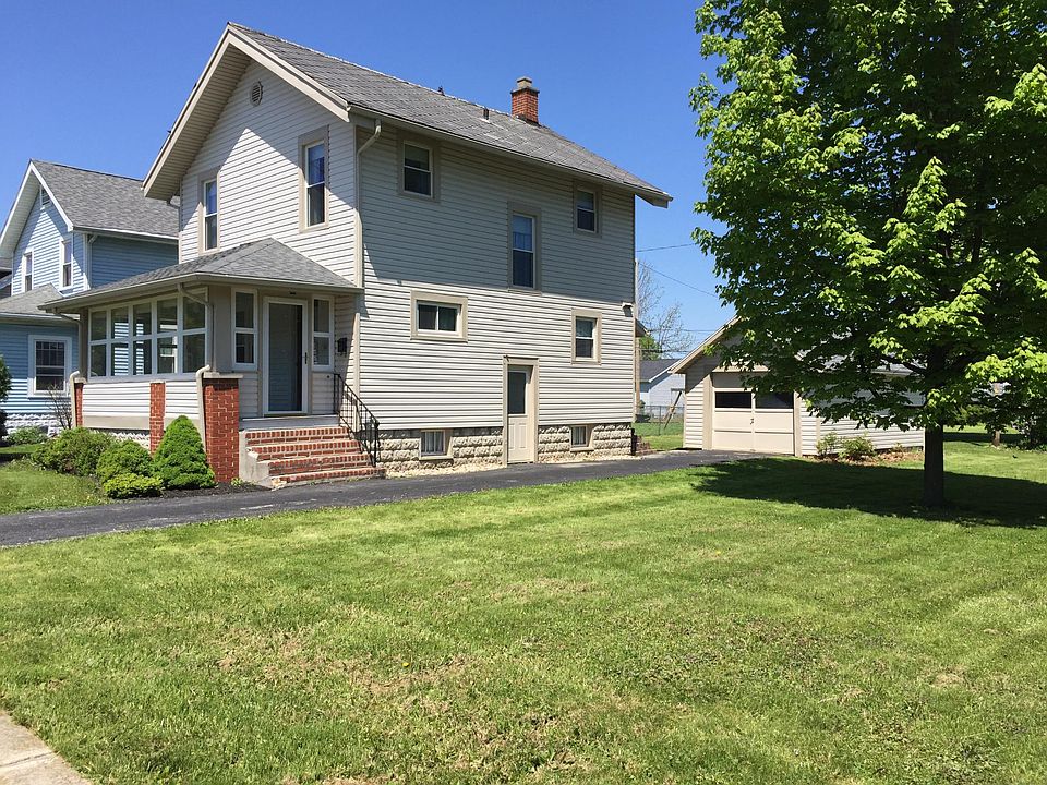 Recent pic of front and side of the house taken from the side yard.