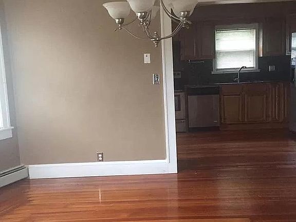 gorgeous dining room leading to the kitchen