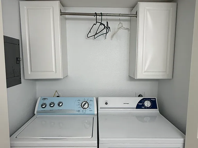 Washer and dryer downstairs in the half bath