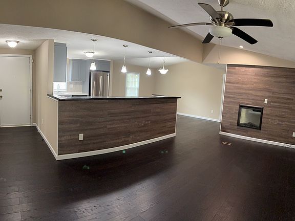 Fireplace is electric. Color of flames can be changed. Nice sized living room, separate eating area, plenty of room in Kitchen.
