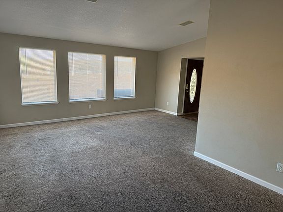 Living area (front door shown in photo)