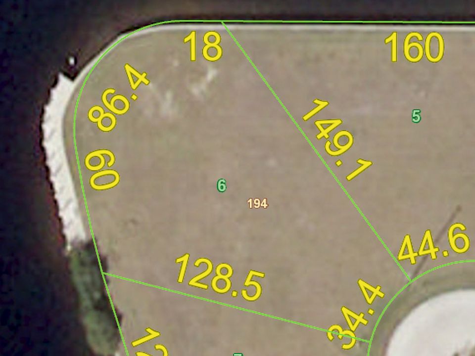aerial view of lot with dock