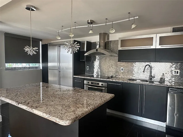 9273 Collins Ave #212 — Photo 9