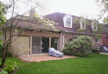 view of family rm & patio from rear