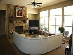 Family Room with Wall Of Windows Overlooking Backyard