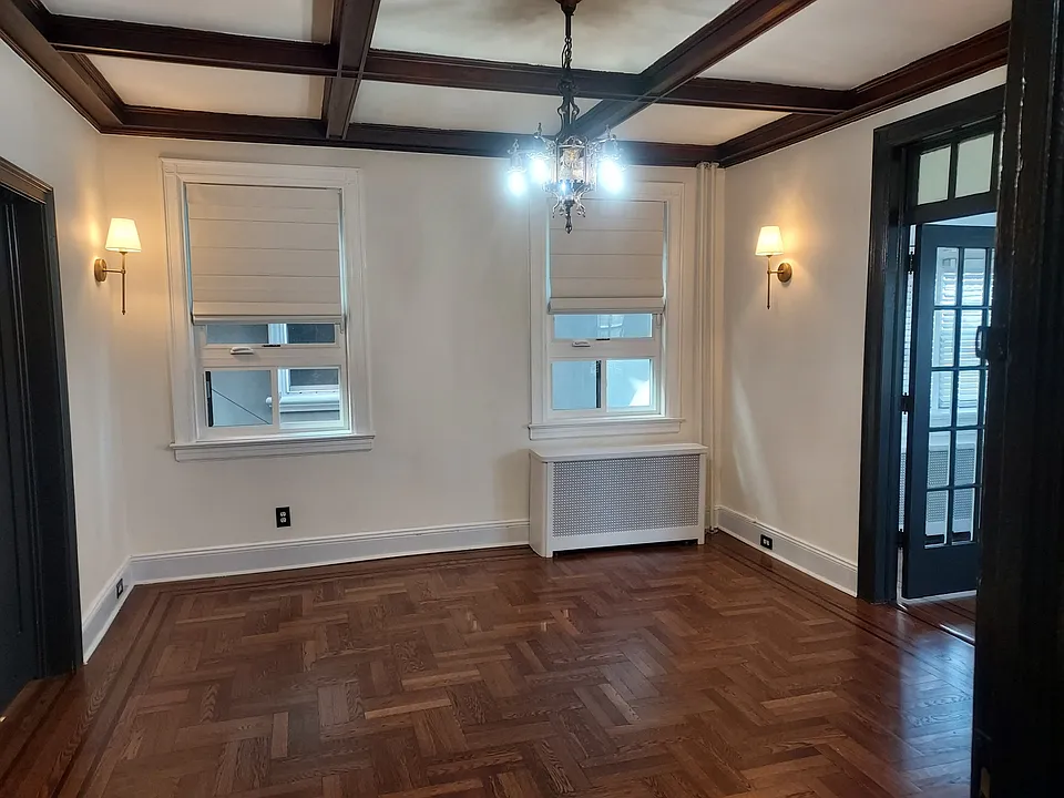 Large living room with historic architechtural detail