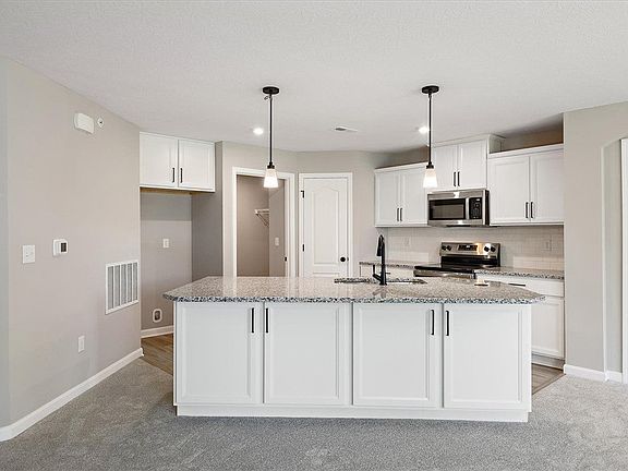 This modern kitchen features a spacious island wit