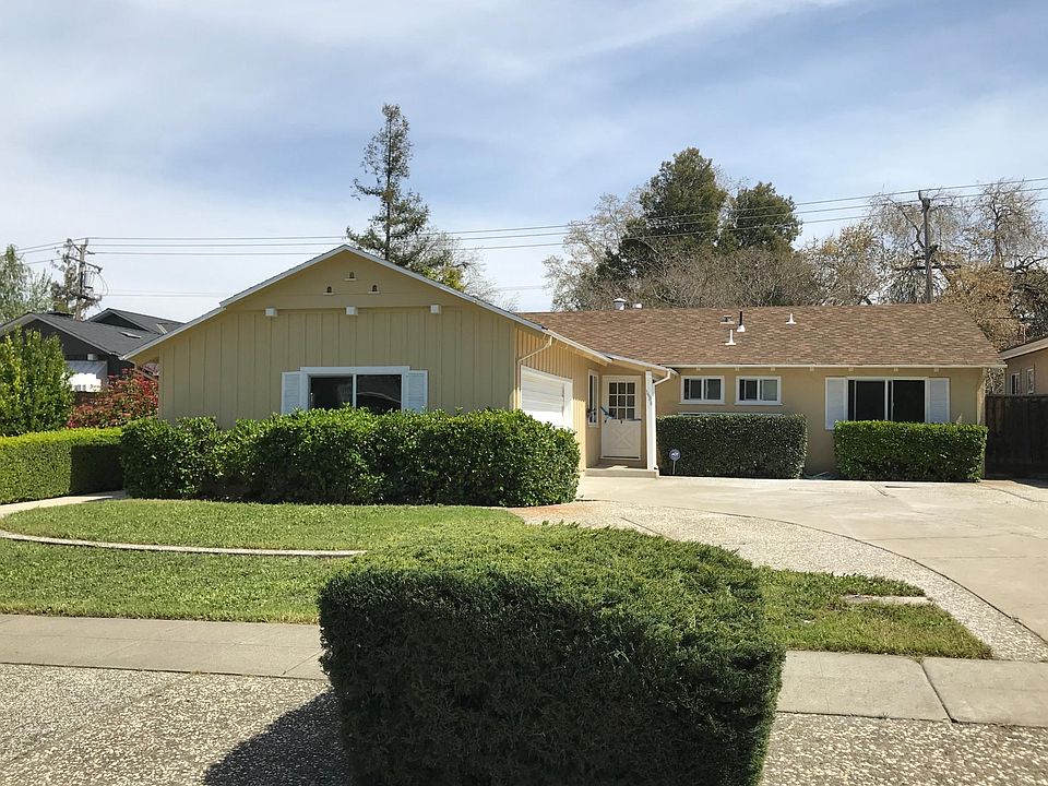 Welcoming Front Yard with Large Driveway