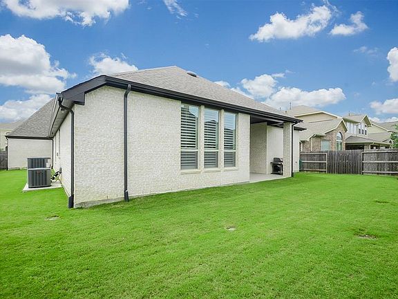 There is plenty of green space for child play or your fur babies. This blank canvas has several possibilities as you see fit.