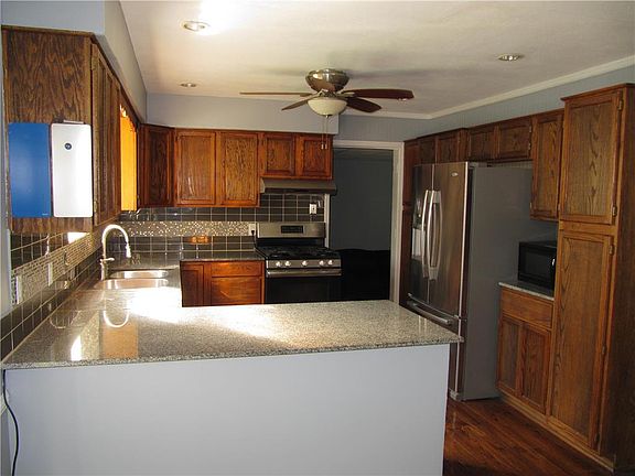 4th image of 11223 E 48th St
