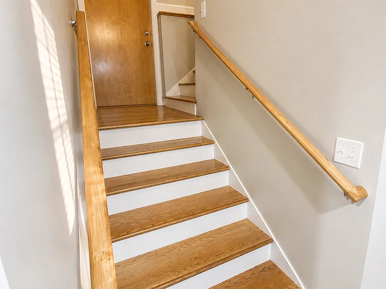 Staircase to bedrooms on second floor