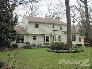 Looking at rear of home from left side