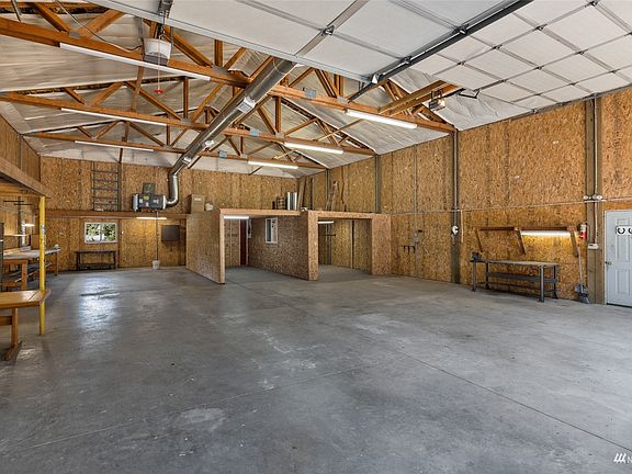 2400 Sq ft of space to store and play.  With propane furnace in the back.