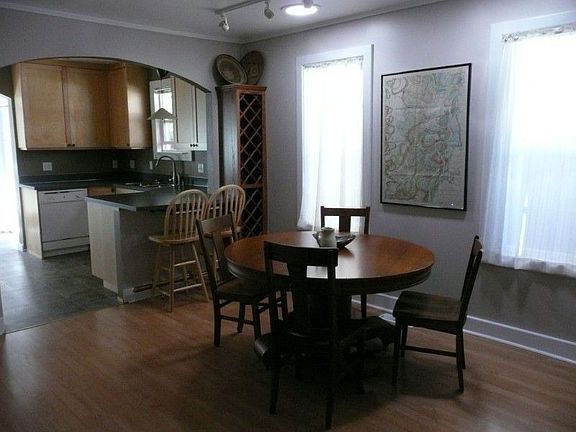 The dining room is illuminted by two Sola-Tubes. The kitchen with new maple cabinetry (2005) is adja