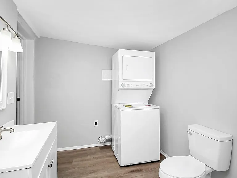 Primary Bathroom and Laundry Area