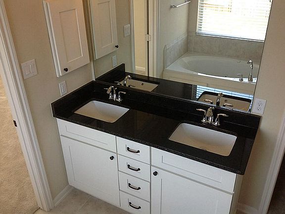 Level 1 granite in all bathrooms